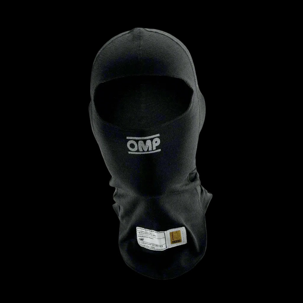 Black OMP 'TECNICA EVO' circuit racing balaclava with the brand logo visible on the fabric.