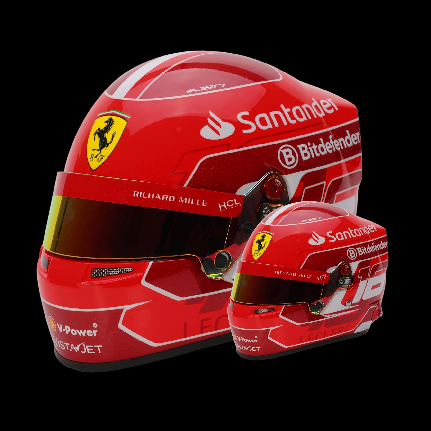 A miniature replica of a Formula 1 racing helmet, predominantly red with sponsor logos, designed to mimic the helmet of Charles Leclerc.