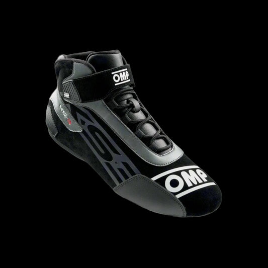 A pair of OMP KS-3 Kart Boots in black and white with visible brand logos, designed for karting with mesh inserts and technical reinforcements.