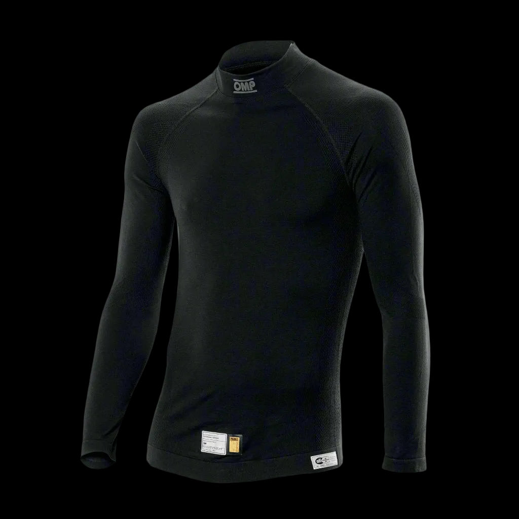 AN OMP long-sleeved black underwear top with a high neck, designed for circuit racing, with a visible brand tag on the bottom.