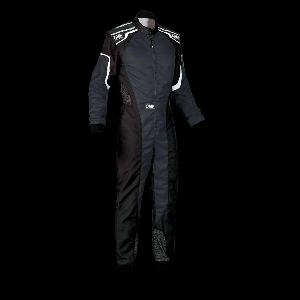 A black OMP KS-3 Kart Suit for KIDS, featuring a low-cut neck collar, long sleeves with contrasting white stripes, and two practical outer pockets.